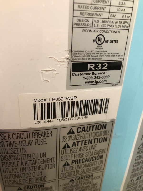 Photo 5 of (BROKEN WHEEL BASE; MISSING WHEEL BASE HARDWARE) 
6,000 BTU (DOE) 115-Volt Portable Air Conditioner with Dehumidifier Function and LCD Remote in White