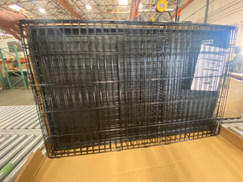 Photo 1 of New World 48" Folding Metal Dog Crate, Includes Leak-Proof Plastic Tray, Dog Crate Measures 48 L X 30 W X 33 H Inches, Fits XL Dog Breeds
