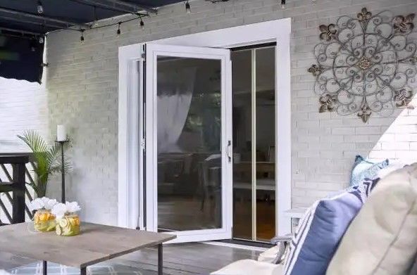 Photo 1 of 72 in. x 75 in. Reversible White Aluminum Prehung Retractable Screen Door
