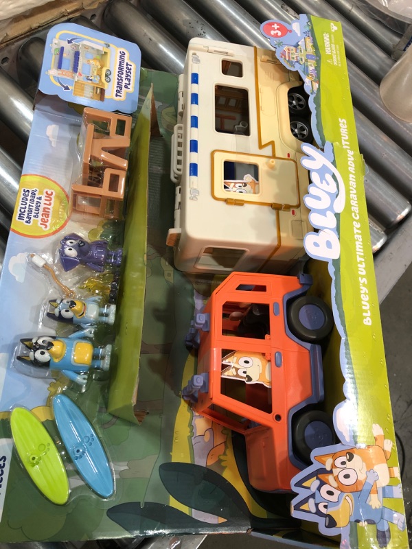 Photo 2 of Bluey Ultimate Caravan Adventures - Caravan Playset and Three 2.5-3" Figures & 4WD Family Vehicle with 2 Surfboards
