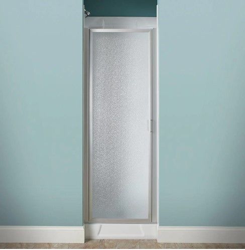 Photo 1 of 24 in. x 64 in. Framed Pivot Shower Door Kit in Silver with Pebbled Glass
