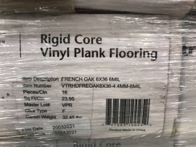 Photo 6 of **PALLET OF 48** 
French Oak 4.4 mm T x 6 in W x 36 in L Rigid Core Luxury Vinyl Plank Flooring (23.95 sq. ft./case), SOLD AS IS, NON-REFUNDABLE
