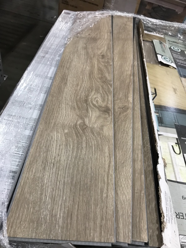 Photo 2 of **PALLET OF 48** 
French Oak 4.4 mm T x 6 in W x 36 in L Rigid Core Luxury Vinyl Plank Flooring (23.95 sq. ft./case), SOLD AS IS, NON-REFUNDABLE
