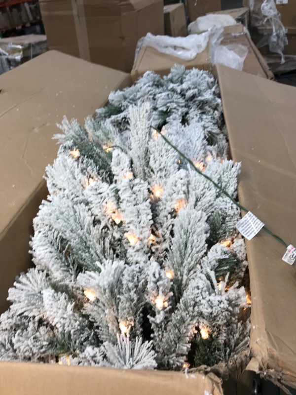 Photo 1 of **INCOMPLETE**
\Puleo International 9 Foot Pre-Lit Flocked Portland Pine Pencil Artificial Christmas Tree with 450 UL Listed Clear Lights
