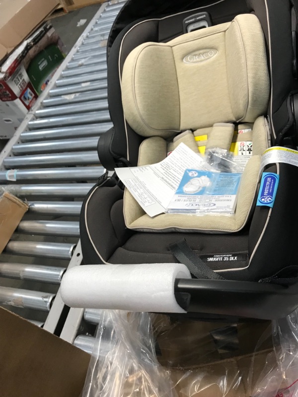 Photo 2 of Graco SnugRide SnugFit 35 DLX Infant Car Seat with Anti-Rebound Bar
