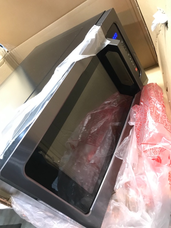 Photo 1 of Toshiba EM131A5C-BS Microwave Oven with Smart Sensor, Easy Clean Interior, ECO Mode and Sound On/Off, 1.2 Cu Ft, Black Stainless Steel