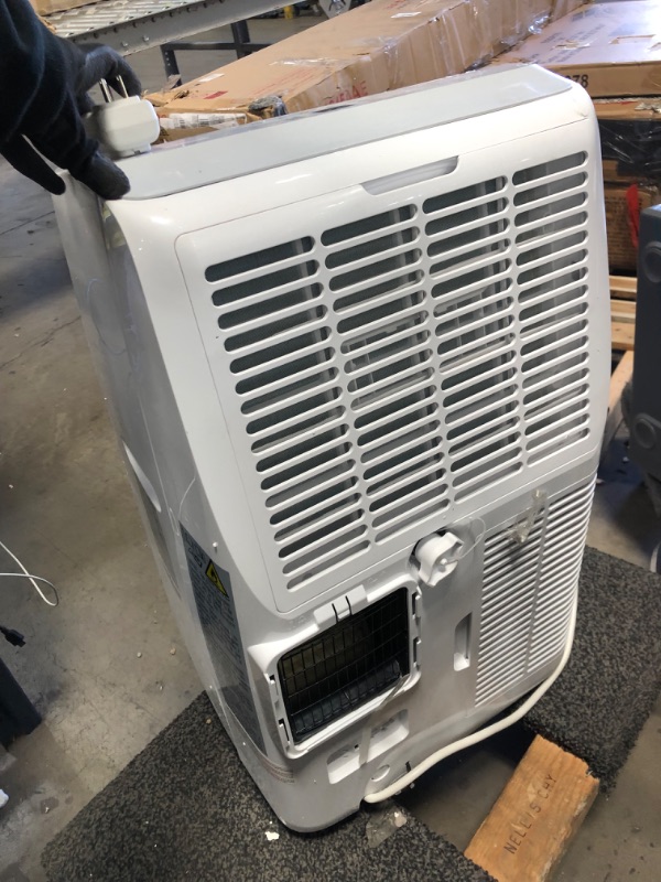 Photo 3 of *USED*
*MISSING all components/ accessory pieces and wheels* 
BLACK+DECKER BPT10WTB Portable Air Conditioner with Remote Control, 10,000 BTU SACC/CEC (14,000 BTU ASHRAE), Cools Up to 450 Square Feet, White
