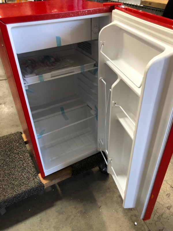 Photo 3 of *SEE last pictures for damage* 
*light inside needs to be repleced* 
Frigidaire Retro Bar Fridge Refrigerator with Side Bottle Opener, 3.2 cu. ft, Red
