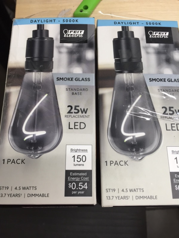 Photo 2 of Feit Electric
2 pack 25-Watt Equivalent ST19 Dimmable Spiral Filament Smoke Glass E26 Vintage Edison LED Light Bulb, Daylight