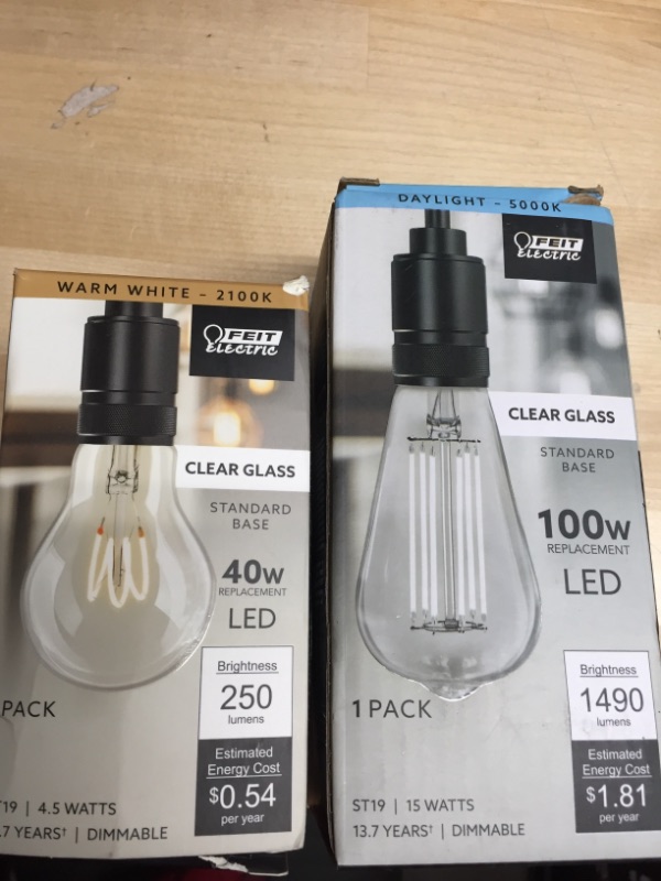 Photo 2 of Feit Electric
100-Watt Equivalent ST19 Dimmable Straight Filament Clear Glass Vintage Edison LED Light Bulb, Daylight and 
40-Watt Equivalent A19 Dimmable H Shape Filament Clear Glass E26 Vintage Edison LED Light Bulb, Warm White