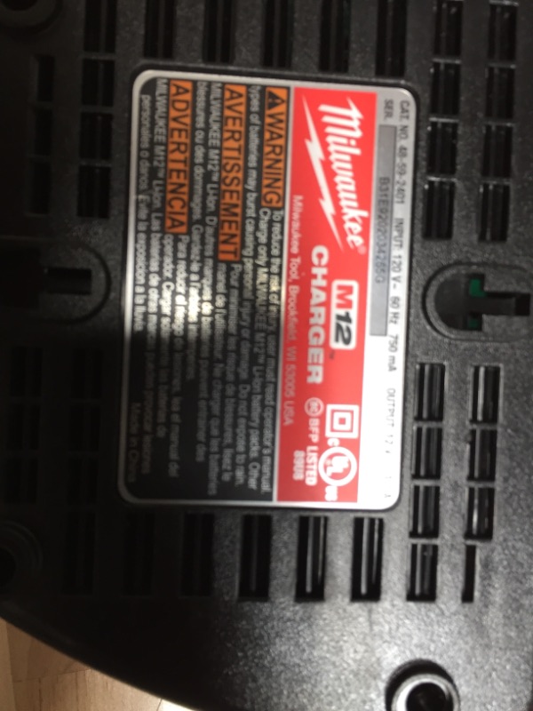 Photo 2 of Milwaukee
M12 12-Volt Lithium-Ion Battery Charger 
SN:B31E9202034265G