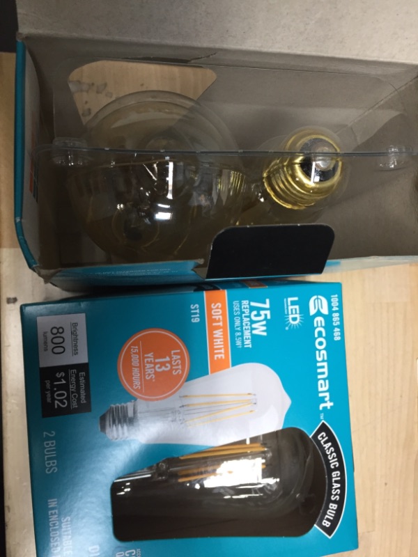 Photo 2 of EcoSmart
75-Watt Equivalent ST19 Antique Edison Dimmable CEC Clear Glass Filament Vintage LED Light Bulb Soft White 2(2-Pack)
one pack has golden fixtures 