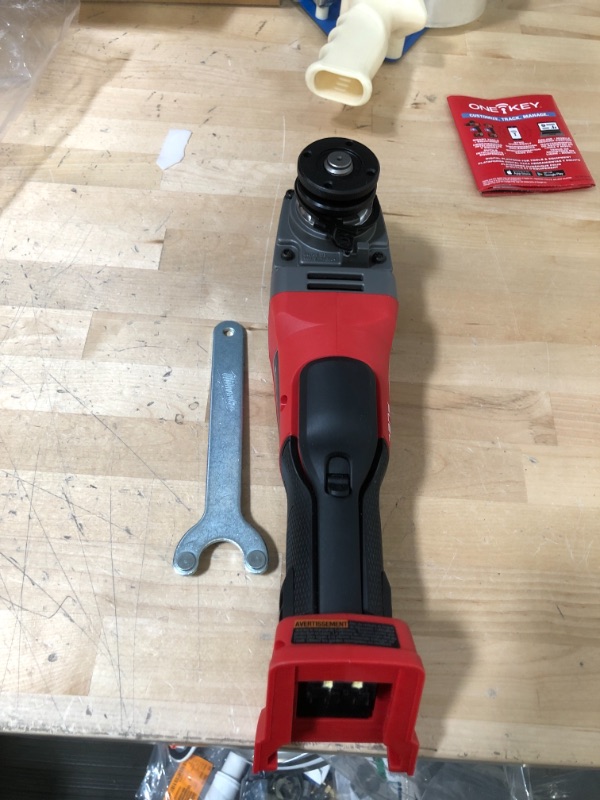 Photo 4 of **INCOMPLETE & DAMAGED**
M18 FUEL 18-Volt Lithium-Ion Brushless Cordless 4-1/2 in./5 in. Grinder w/Paddle Switch (Tool-Only)
