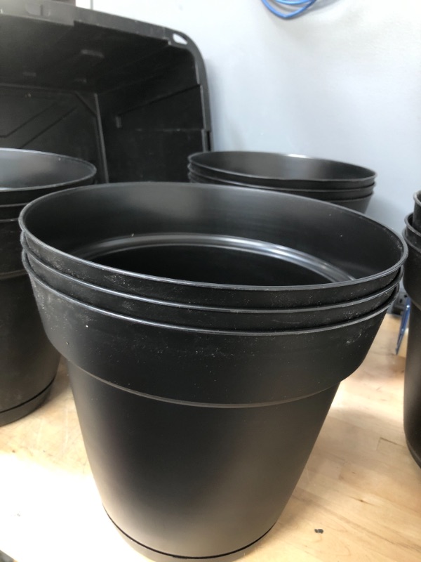 Photo 2 of **SET OF 3**
Graff 11.91 in. x 10.7 in. Black Resin Planter with Saucer
