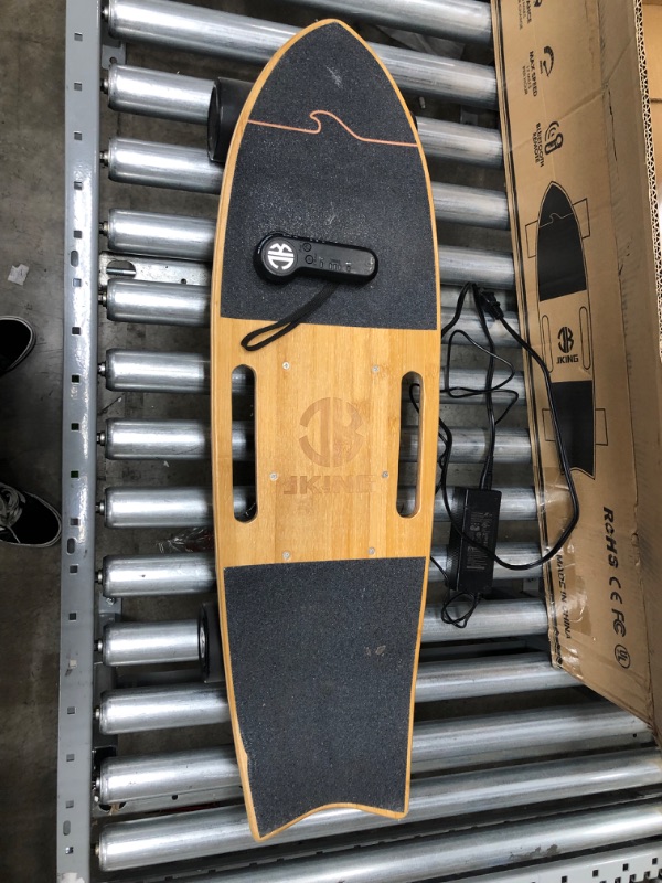 Photo 3 of Jking Electric Skateboard Electric Longboard with Remote Control Electric Skateboard,700W Hub-Motor ,16.7 MPH Top Speed,8.2 Miles Range,3 Speeds Adjustment