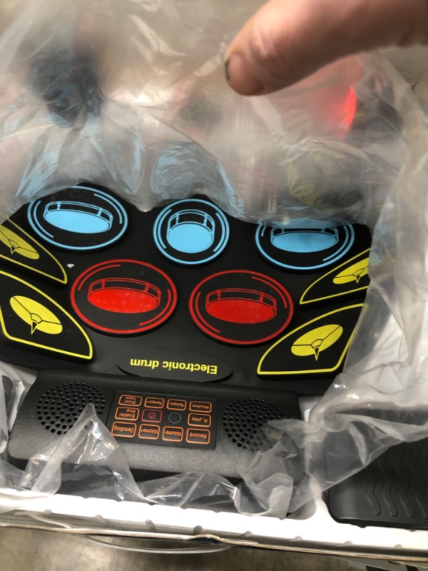 Photo 1 of (9 Pads) Electronic Drum Set with Light Up Drumsticks and Stand, Electronic Drum Pad with 5 Different Drum Kit, 10 Unique Rhythms, Bulit-in Double Speakers, Roll Up Drum Kit, Kids Drum Set
