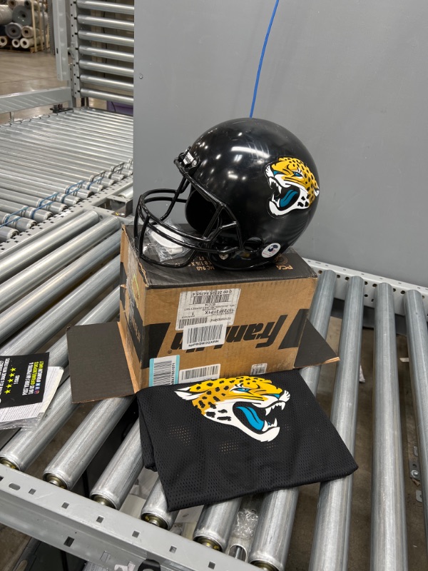 Photo 2 of JACKSONVILLE JAGUARS (NOT CARDINALS) Franklin Sports NFL Kids Football Helmet and Jersey Set - Youth Football Uniform Costume - Helmet, Jersey, Chinstrap