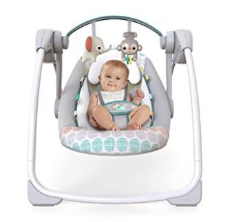 Photo 1 of Bright Starts Whimsical Wild Portable Compact Automatic Swing with Tunes
