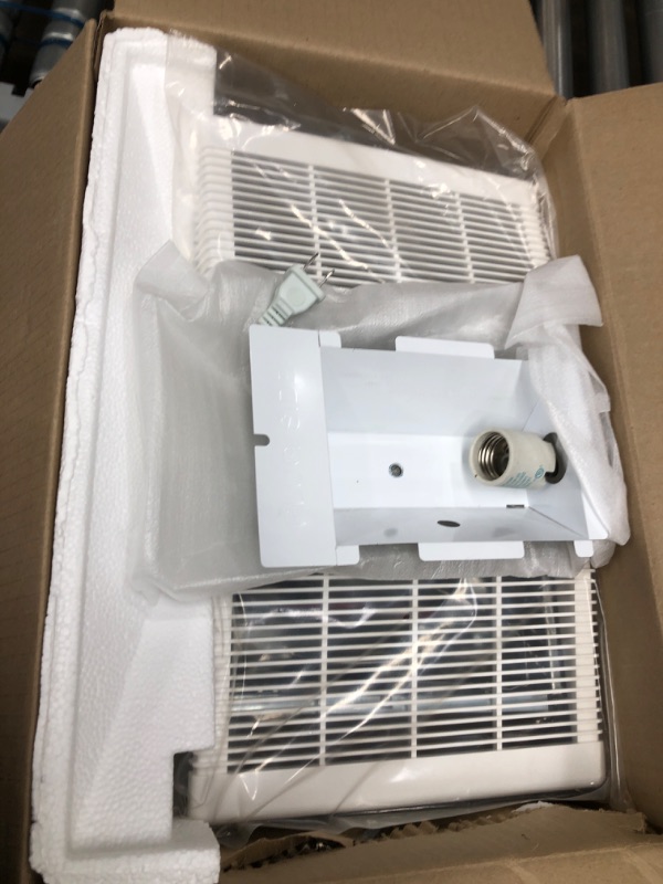 Photo 1 of Broan-NuTone 80 CFM Ceiling Bathroom Exhaust Fan with Light and 1300-Watt Heater