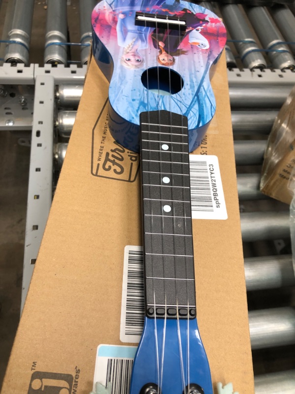 Photo 2 of First Act Discovery Frozen 2 Ukulele (Small Kids Guitar with Four Strings)
