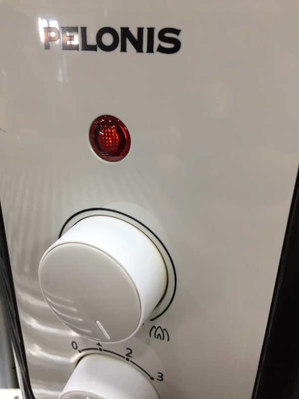 Photo 1 of 1,500-Watt Oil-Filled Radiant Electric Space Heater with Thermostat
