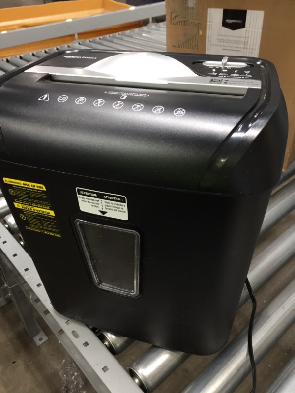 Photo 2 of Amazon Basics 12-Sheet Cross-Cut Paper and Credit Card Home Office Shredder

**item powers on, but is NONFUNCTIONAL**