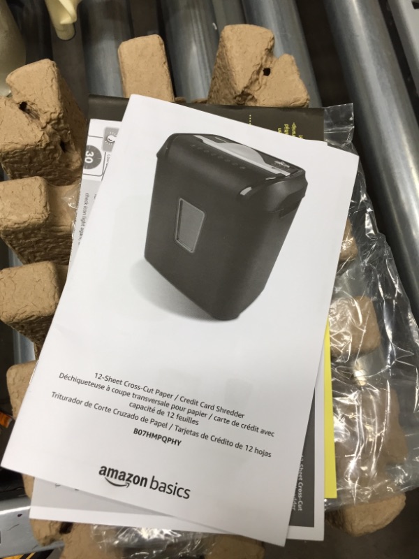 Photo 4 of Amazon Basics 12-Sheet Cross-Cut Paper and Credit Card Home Office Shredder

**item powers on, but is NONFUNCTIONAL**