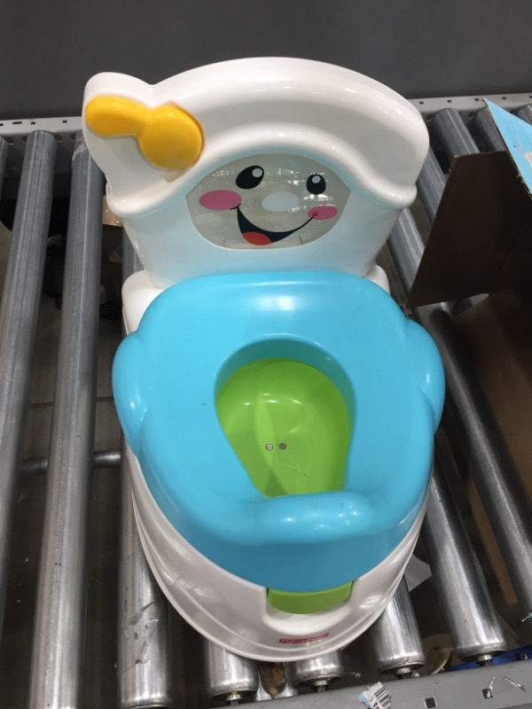 Photo 2 of Fisher-Price Learn-to-Flush Potty Multicolor
