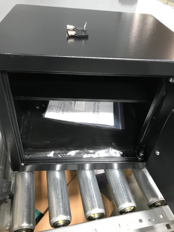 Photo 1 of small safe with  keys 