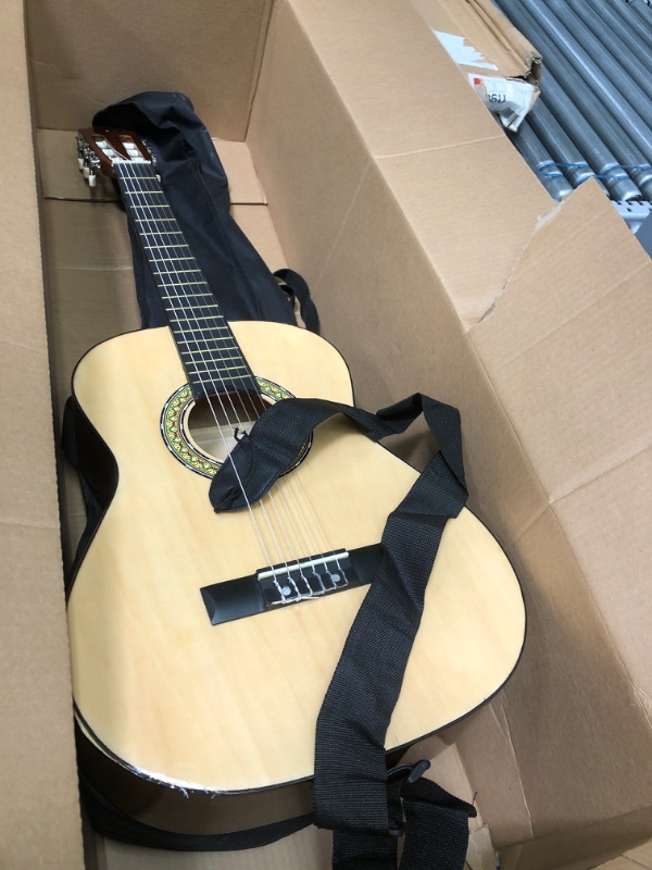 Photo 3 of GUITAR ONLY
Pyle 36” Classical Acoustic Guitar-3/4 Junior Size 6 Linden Wood Guitar w/Gig Bag, Tuner, Nylon Strings, Picks, Strap, for Beginners, Adults, Right, Natural (PGACLS82)
