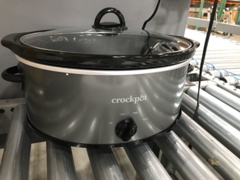 Photo 2 of **DENT IN THE CENTER ON THE BACK OF CROCK POT**TESTED AND FUNCTIONS**
Crock-Pot Design to Shine 7-qt. Slow Cooker, Black
