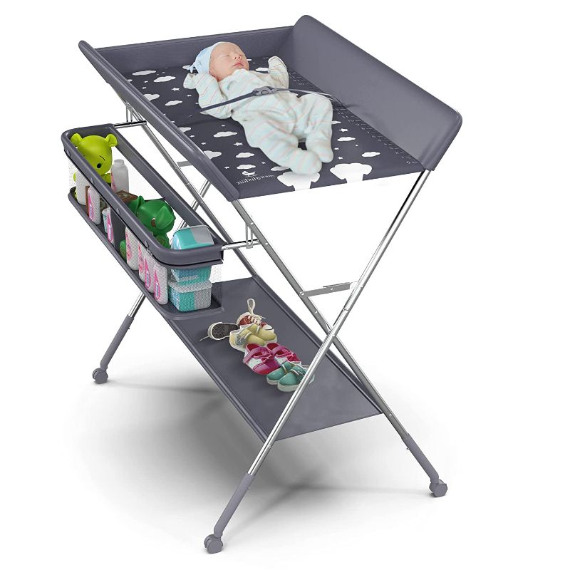 Photo 1 of Babylicious Baby Portable Changing Table - Foldable Changing Table with Wheels - Portable Diaper Changing Station - Adjustable Height Baby Changing Table-Safety Belt and Large Storage Rack for Infants
