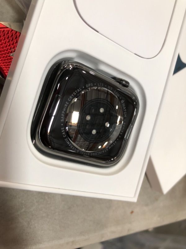 Photo 4 of brand new!!**
Apple Watch Series 7 GPS + Cellular, 45mm Graphite Stainless Steel Case with Abyss Blue Sport Band - Regular
(Item was Open to Verify Contents and Serial Number)