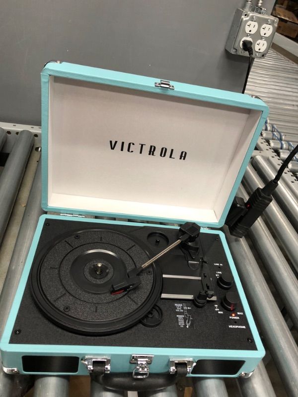 Photo 3 of ***PARTS ONLY*** NON FUNCTIONAL****TESTED, TURNS ON 
SPEAKERS DONT WORK*** Victrola Vintage 3-Speed Bluetooth Portable Suitcase Record Player with Built-in Speakers