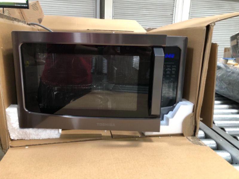 Photo 2 of ***PARTS ONLY*** Toshiba EM131A5C-BS Microwave Oven with Smart Sensor, Easy Clean Interior, ECO Mode and Sound On/Off, 1.2 Cu Ft, Black Stainless Steel
