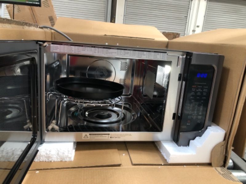 Photo 3 of ***PARTS ONLY*** Toshiba EM131A5C-BS Microwave Oven with Smart Sensor, Easy Clean Interior, ECO Mode and Sound On/Off, 1.2 Cu Ft, Black Stainless Steel
