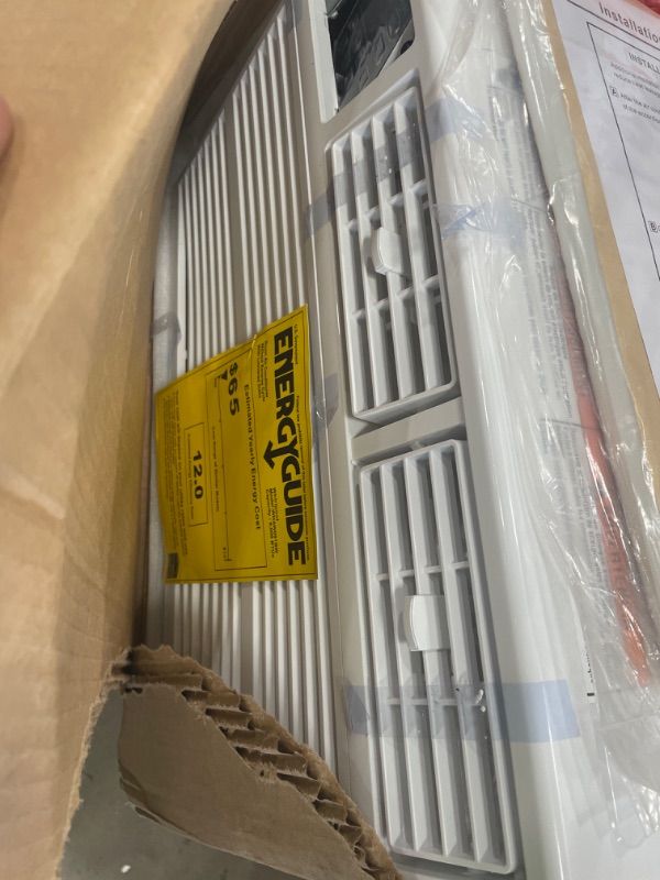 Photo 5 of ***FOR PARTS ONLY -NONFUNCTIONAL***
 - Whirlpool 6000 BTU 115 Volt Energy Star Certified Window Air Conditioner with Temperature Sensing Remote