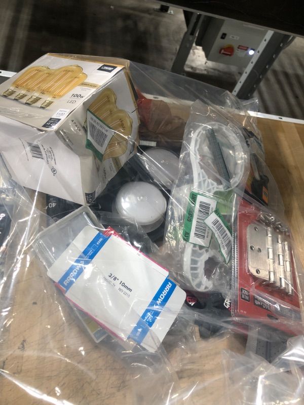 Photo 1 of ***NOT REFUNDABLE***
 BAG OF MIXED HOME DEPOT GOODS - LIGHTS, HINGES, HOME GOODS, TOOLS