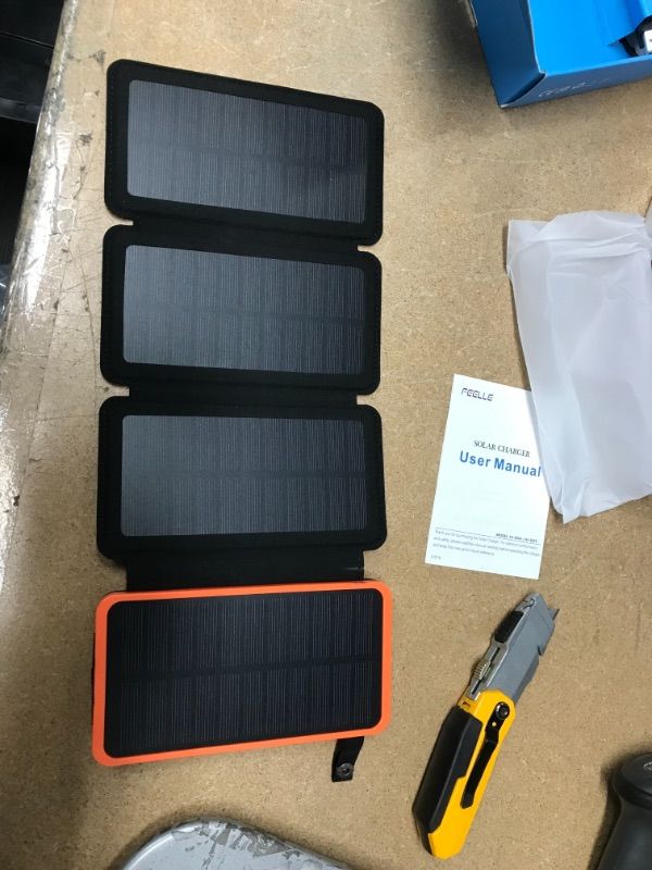 Photo 2 of FEELLE Solar Power Bank Charger 25000mAh Solar Phone Charger with 4 Solar Panels & Dual 2.1A USB Ports Portable Solar Powered External Battery for iPhone Cell Phone Devices
