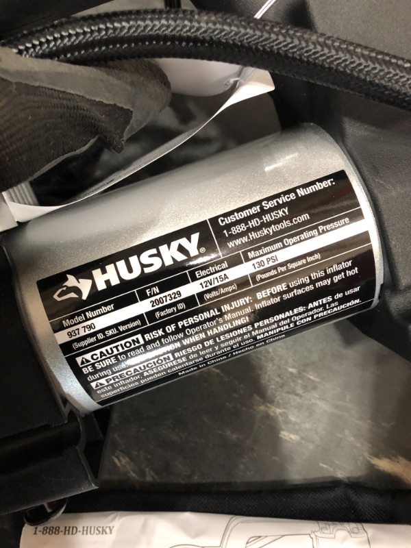 Photo 3 of *MISSING attachment pieces* 
Husky 12-Volt Inflator
