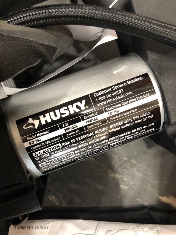 Photo 1 of *MISSING attachment pieces* 
Husky 12-Volt Inflator