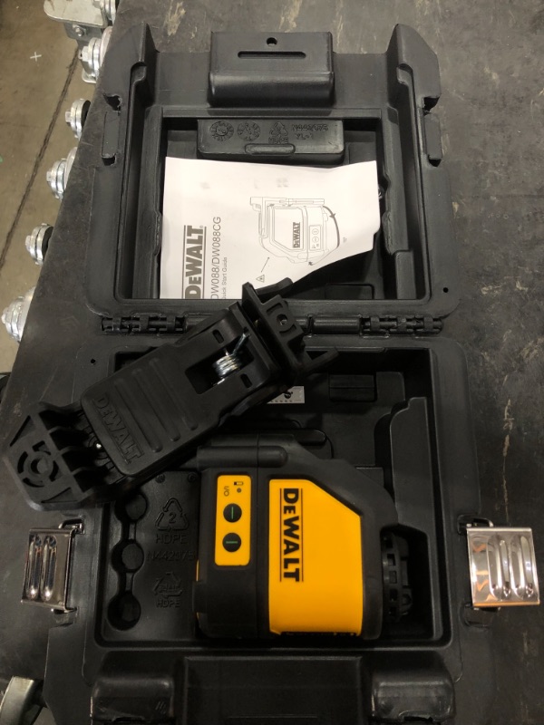 Photo 2 of *USED*
*MISSING batteries* 
DEWALT 165 ft. Green Self-Leveling Cross Line Laser Level with (3) AAA Batteries & Case