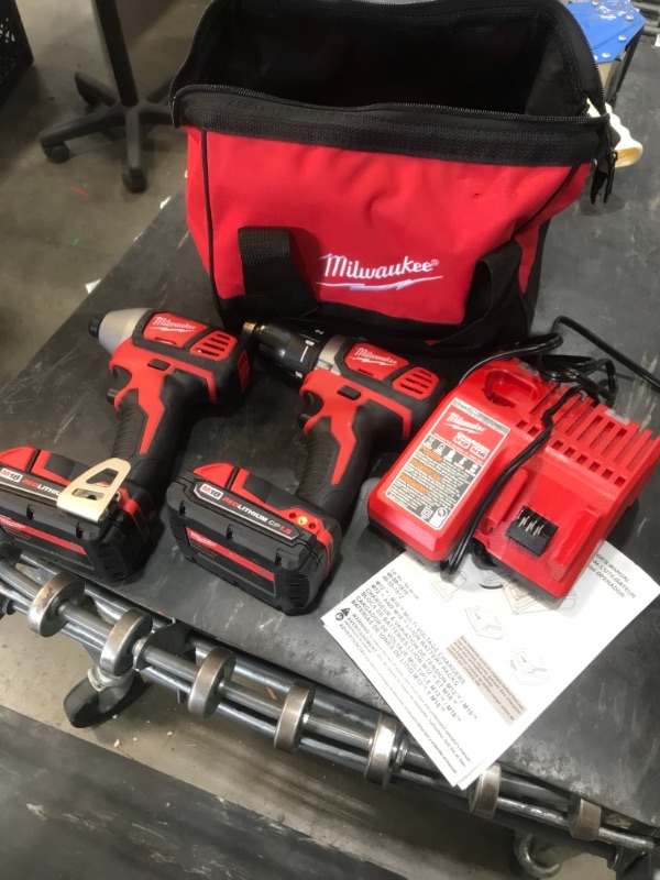 Photo 2 of *USED*
*SEE last picture for damage*
Milwaukee M18 18-Volt Lithium-Ion Cordless Drill Driver/Impact Driver Combo Kit w/ Two 1.5Ah Batteries, Charger Tool Bag (2-Tool)