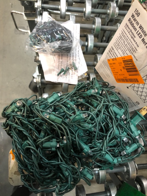 Photo 3 of *USED*
*1 set of lights is NOT functional, fuse possibly blew* 
Home Accents Holiday 150 LED Ribbon Net Lights, 2 pk
