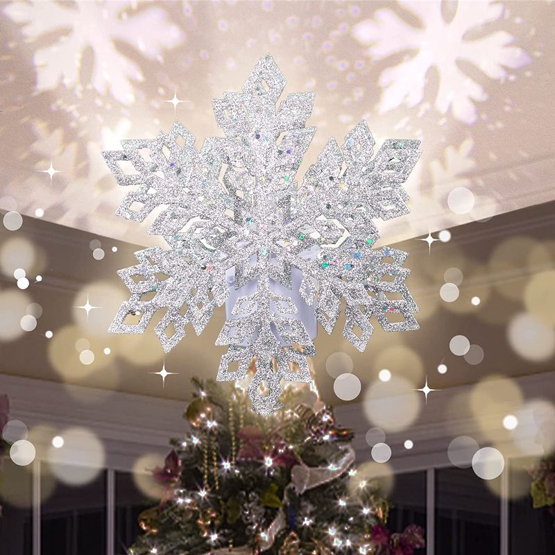 Photo 1 of  Christmas Tree Topper Lighted Snowflake Tree Topper with Rotating Snowflake LED Projector