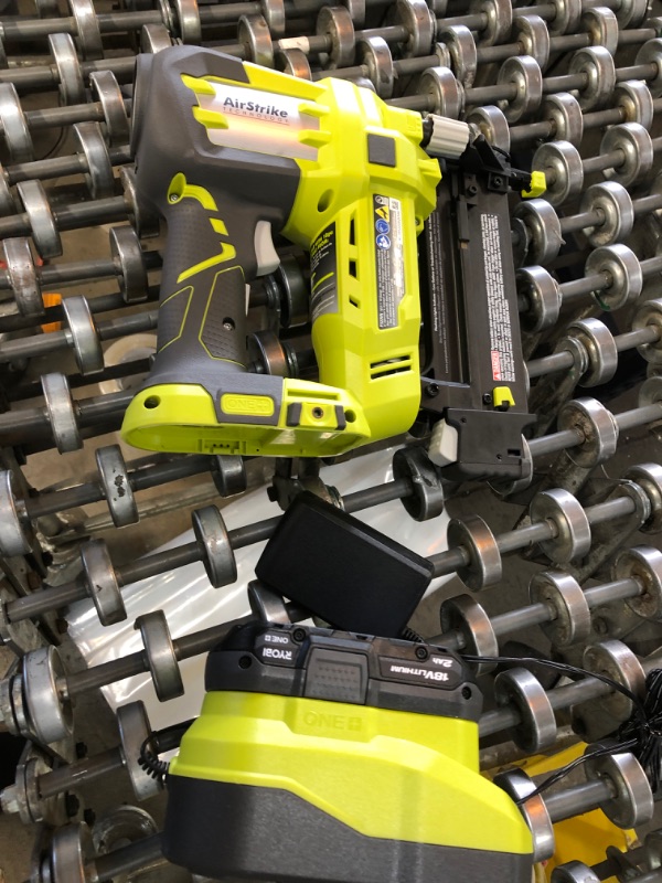 Photo 2 of Ryobi 3 Piece 18V One+ Airstrike Brad Nailer Kit (Includes: 1 x P320 Brad Nailer, 1 x P190 18-Volt ONE+ 2.0 Ah lithium-ion battery, P118 dual chemistry charger (Renewed)
