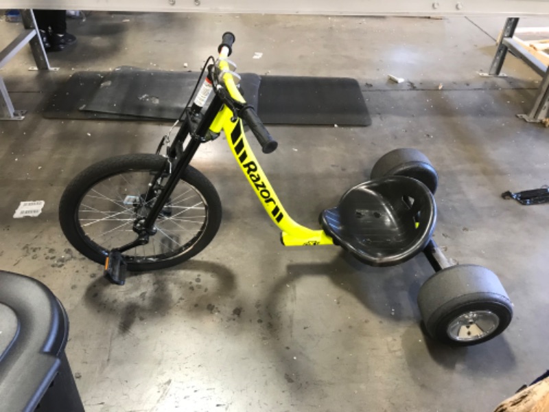 Photo 5 of ONE OF THE PEDELS ARE BROKEN***Razor DXT Drift Trike Yellow, One Size