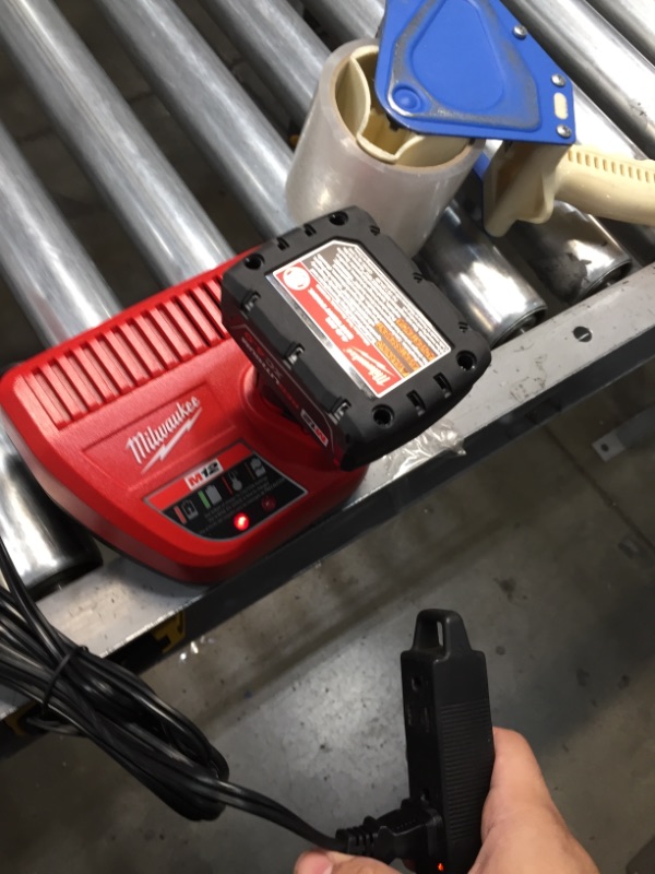 Photo 1 of M12 12-Volt Lithium-Ion 4.0 Ah and 2.0 Ah Battery Packs and Charger Starter Kit