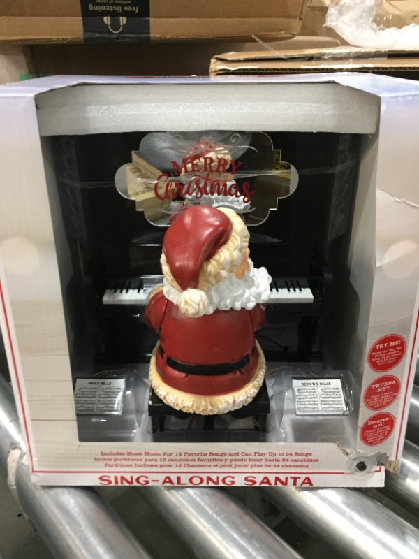 Photo 2 of **santa is missing the right hand but he can still play the piano**
Mr. Christmas Sing-A-Long Santa Christmas Décor, 7.4-inch, Black
