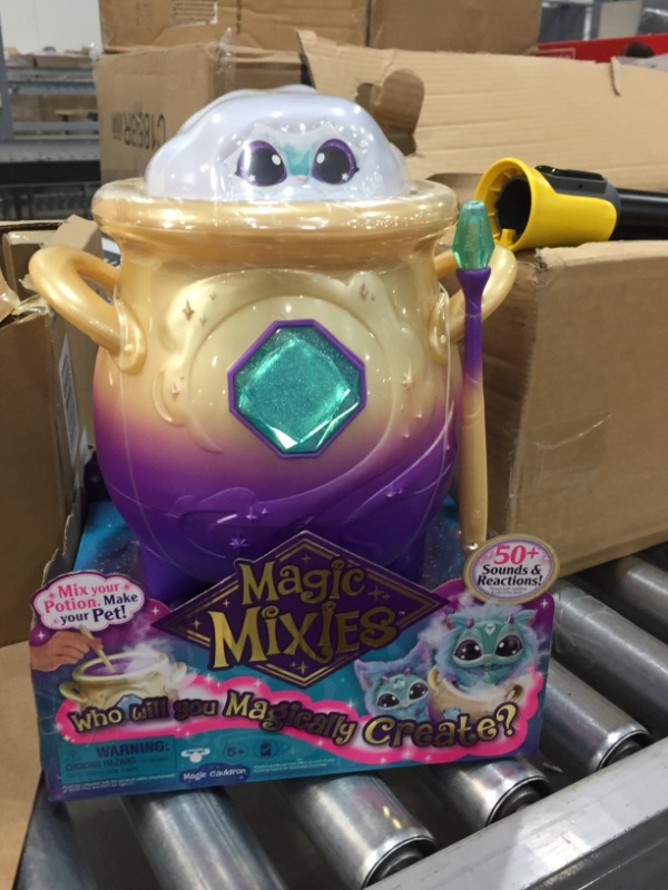 Photo 2 of Magic Mixies Magical Misting Cauldron with Interactive 8 inch Blue Plush Toy and 50+ Sounds and Reactions, Multicolor
